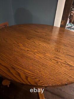Antique Oak Round Dining Table 42 with oval with Leaf with nailhead trim