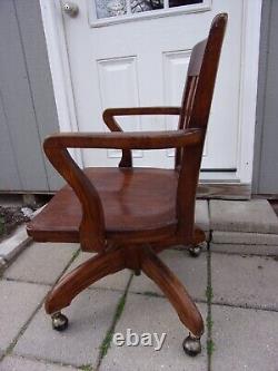 Antique Solid Oak Mission Bankers Lawyers Desk Arm Chair Swivel Rolling