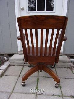 Antique Solid Oak Mission Bankers Lawyers Desk Arm Chair Swivel Rolling