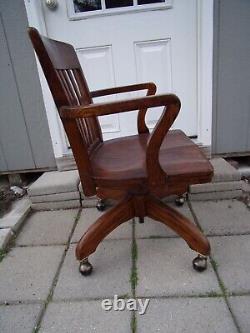 Antique Solid Oak Mission Bankers Lawyers Desk Arm Chair Swivel Rolling