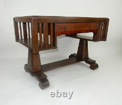 Antique Stickley era tiger oak mission desk with side Book shelves. 44 inches