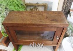 Antique oak Medicine cabinet Mission style with beveled edge mirror 1800 1900's