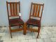 Superb ANTIQUE pair G STICKLEY chairs with orig leather w5409